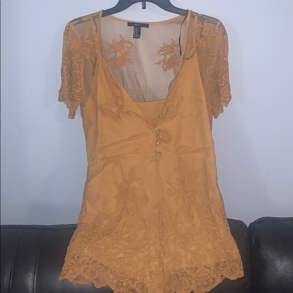 A mustard yellow romper